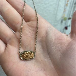 Kendra Scott necklace.